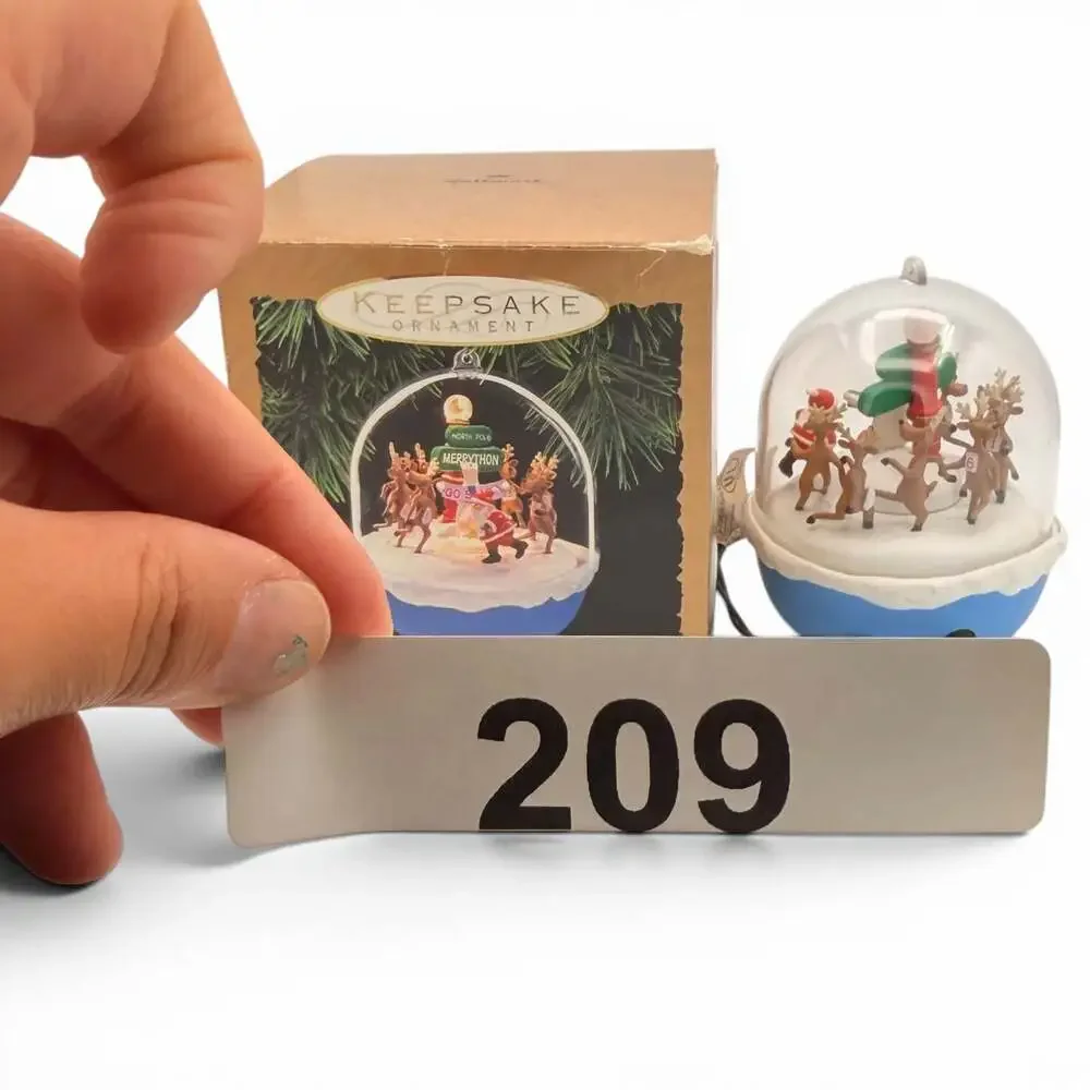 1993 Hallmark Keepsake Ornament North Pole Merrython Light and Motion Magic